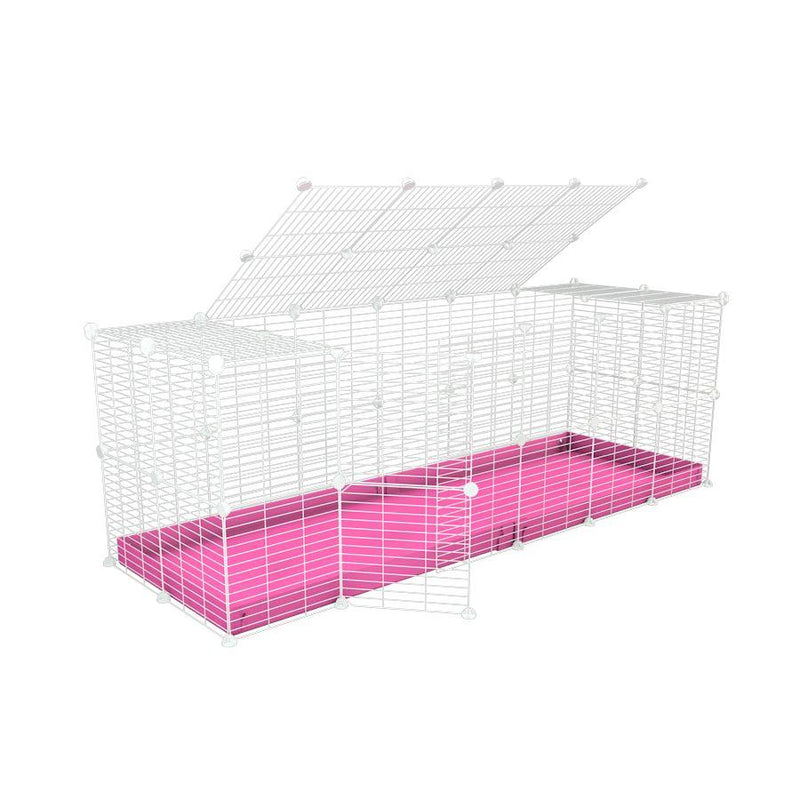 Une cavy cage 6x2 pour lapin avec couvercle un coroplast rose et des grilles blanches a maillage fin par kavee