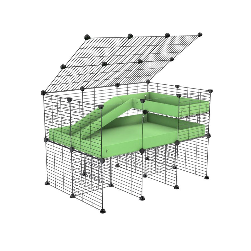 une cavy cage 3x2 avec panneaux transparents en plexiglass  pour cochons d'inde avec rehausseur couvercle loft rampe coroplast vert pistache et grilles de kavee