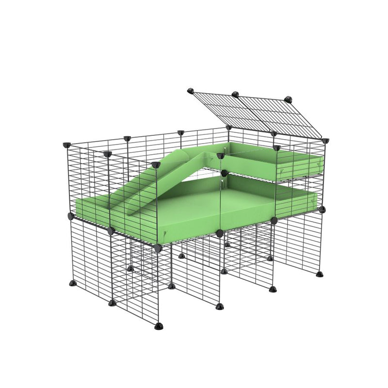 une cavy cage 3x2 pour cochons d'inde  avec panneaux transparents en plexiglass avec rehausseur loft rampe coroplast vert pistache et grilles a petits trous