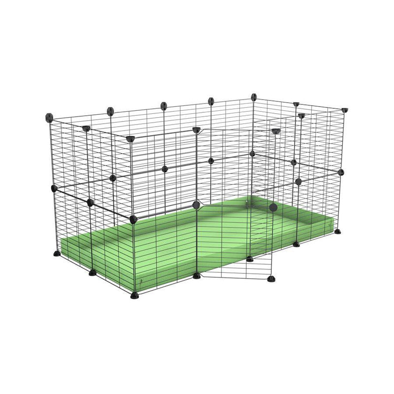 Une kavee cage modulaire 4x2 pour lapins avec un coroplast vert pistache et des grilles a barreaux etroits