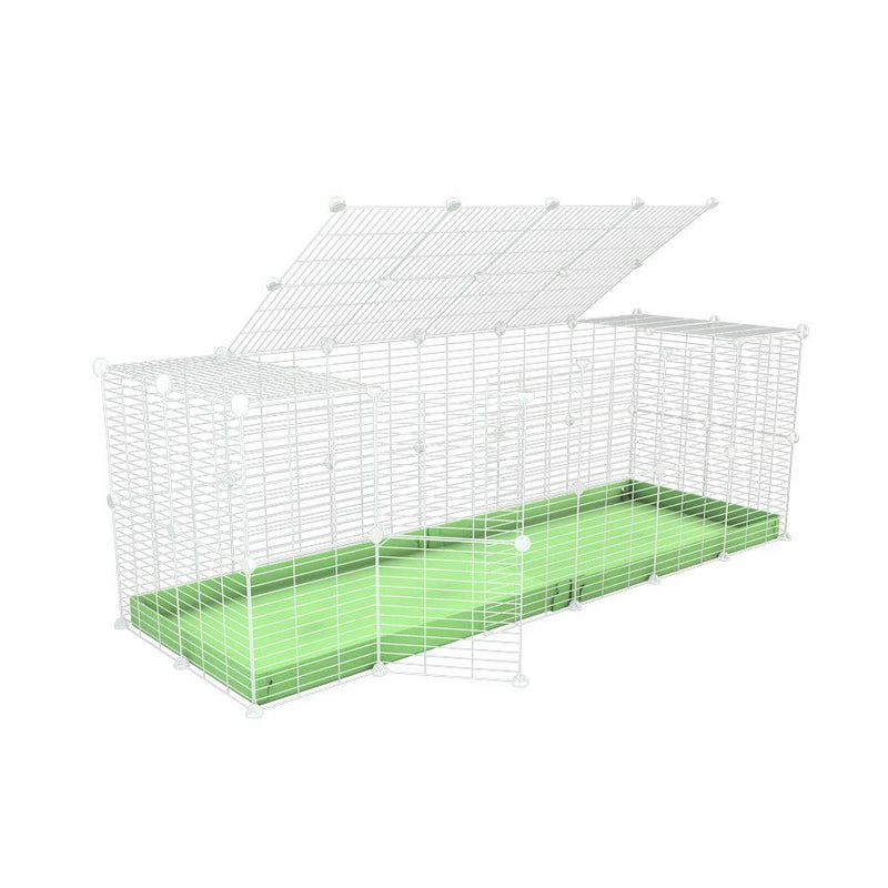 Une cavy cage 6x2 pour lapin avec couvercle un coroplast vert pistache et des grilles blanches a maillage fin par kavee