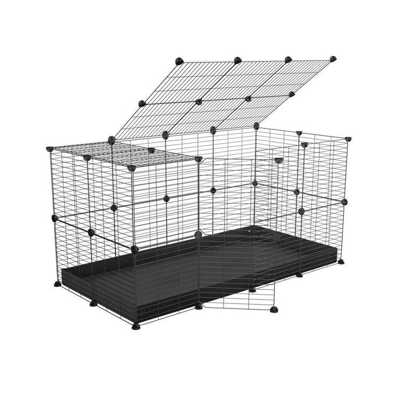 Une cavy cage 4x2 modulaire pour lapins avec un couvercle un coroplast noir et des grilles a maillage fin par kavee
