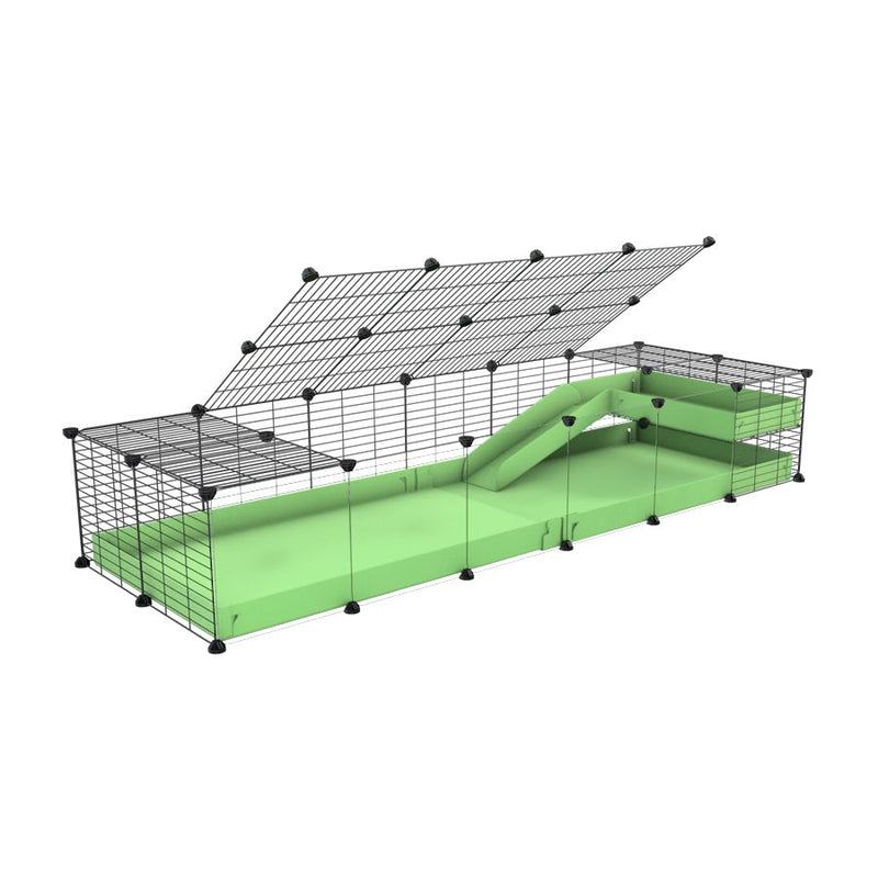 une cavy cage 6x2  avec panneaux transparents en plexiglass pour cochons d'inde avec une rampe un loft un toit un coroplast vert et grilles fines de kavee france