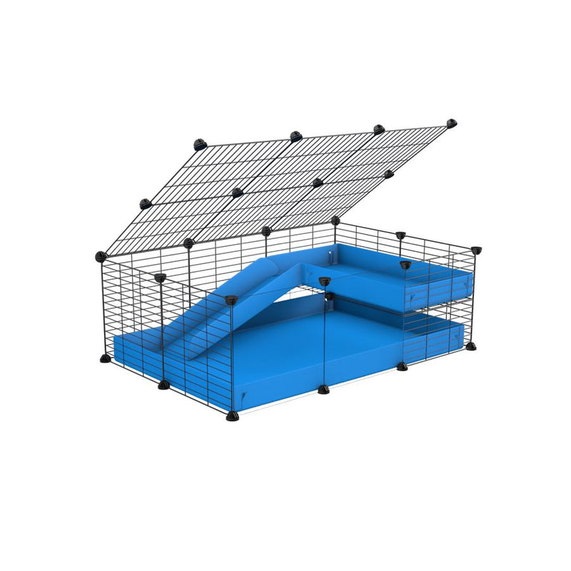 une kavee cage 3x2 pour cochons d'inde avec panneaux transparents en plexiglass avec une rampe un loft un couvercle un coroplast bleu et grilles fines