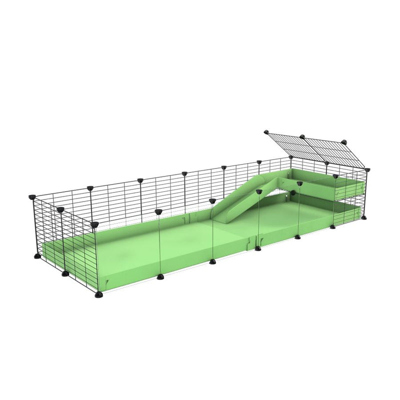 une cavy cage 6x2  avec panneaux transparents en plexiglass pour cochons d'inde avec une rampe un loft un coroplast vert pistache et grilles fines sans danger de kavee