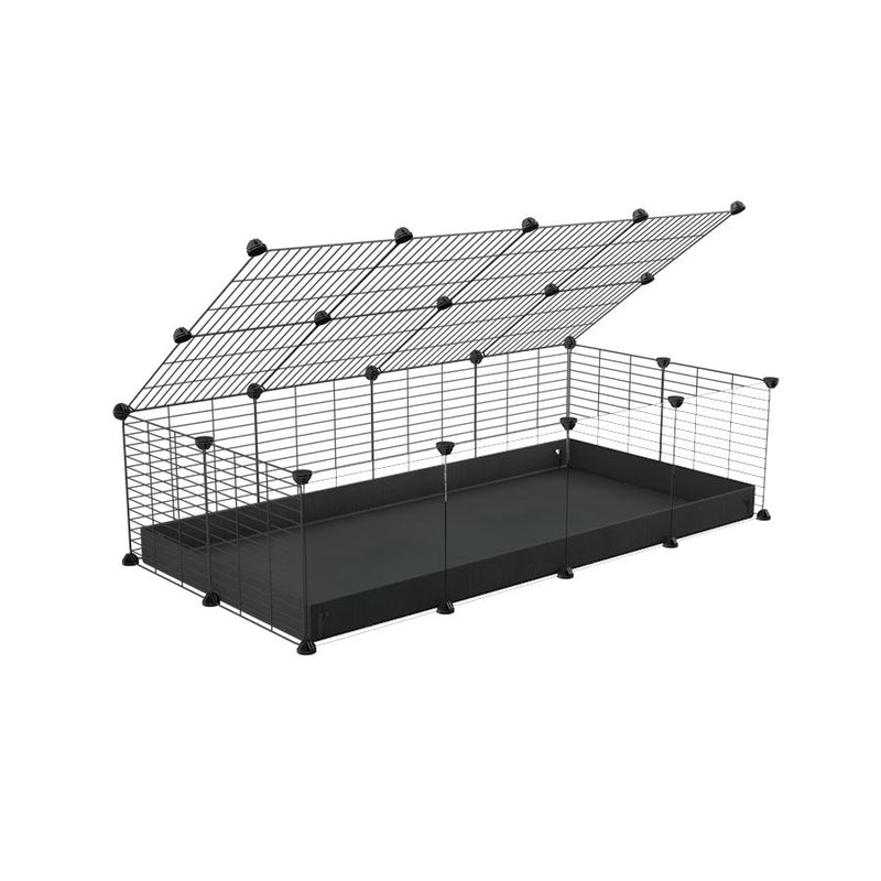 une cavy cage 4x2 pour cochons d'inde avec panneaux transparents en plexiglass avec couvercle coroplast noir et grilles avec barreaux etroits de kavee
