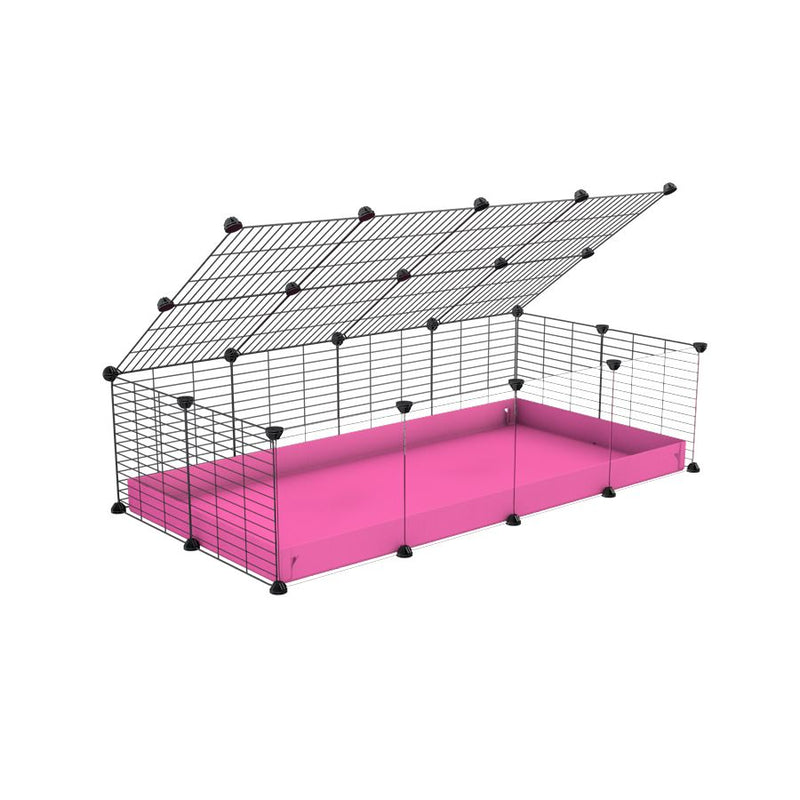 une cavy cage 4x2 pour cochons d'inde avec panneaux transparents en plexiglass avec couvercle coroplast rose et grilles avec barreaux etroits de kavee