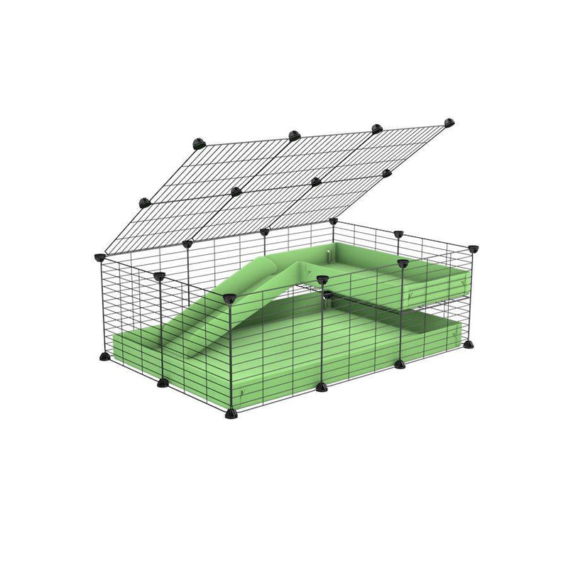 une cavy C&C cage 3x2 pour cochons d'inde avec une rampe un loft un couvercle un coroplast vert pistache