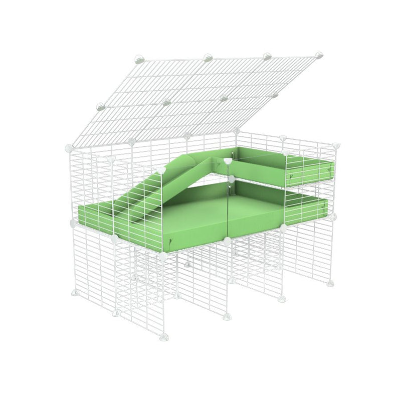 une cavy cage 3x2 avec panneaux transparents en plexiglass  pour cochons d'inde avec rehausseur couvercle loft rampe coroplast vert et grilles blanches de kavee