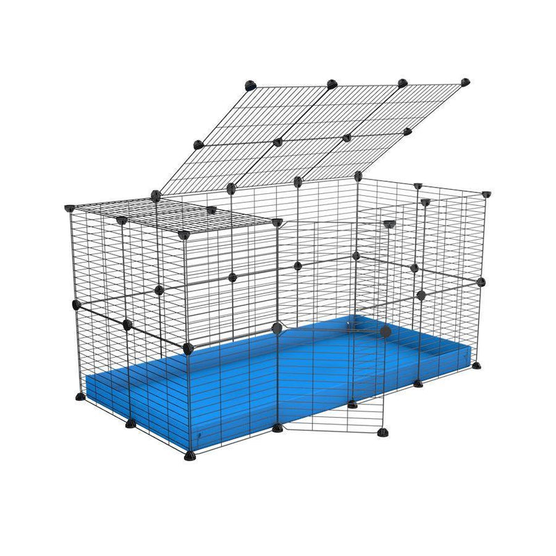 Une cavy cage 4x2 modulaire pour lapins avec un couvercle un coroplast bleu et des grilles a barreaux etroits par kavee