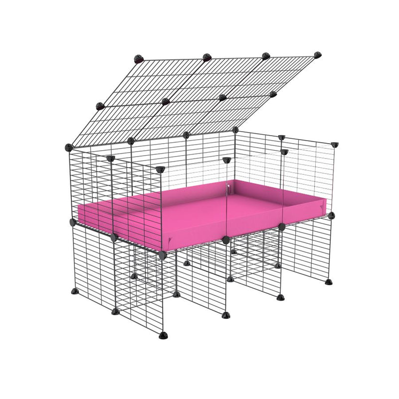 une cavy cage 3x2 pour cochons d'inde  avec panneaux transparents en plexiglass avec rehausseur couvercle correx rose et grilles fines de kavee france
