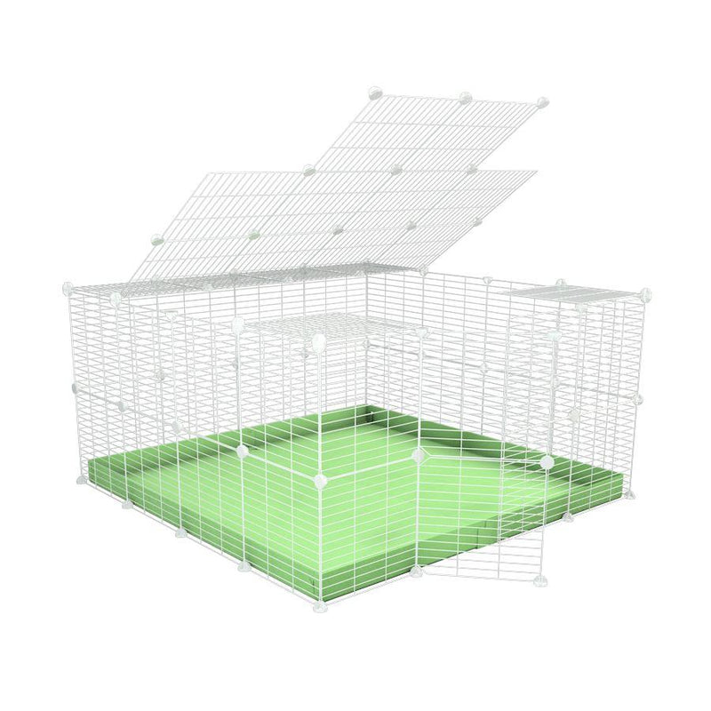 Une cavy cage modulaire pour lapin 4x4 avec toit grilles blanches fines petits trous coroplast vert pastel de kavee france