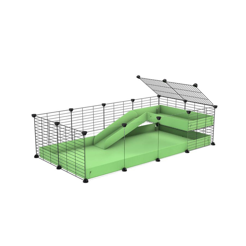 une cavy cage 4x2  avec panneaux transparents en plexiglass pour cochons d'inde avec une rampe un loft un coroplast vert pistache et grilles fines sans danger de kavee