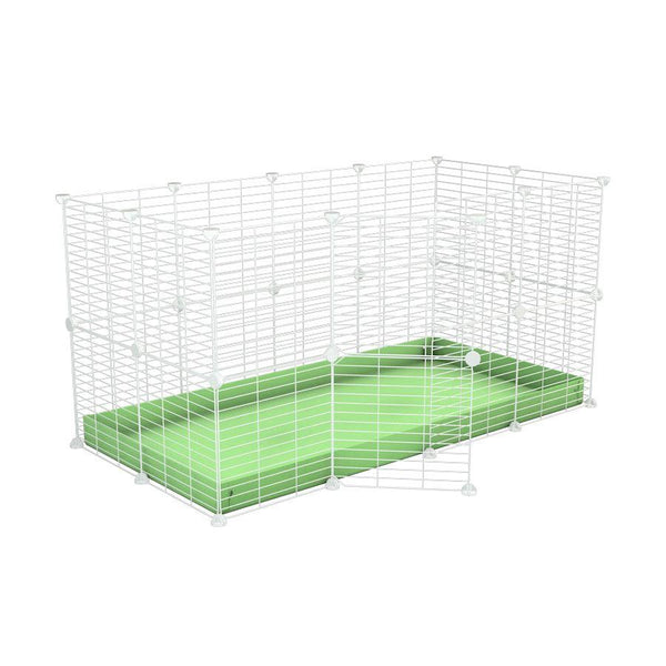 Une kavee cage modulaire 4x2 pour lapins avec un coroplast vert pistache et des grilles blanches a barreaux etroits