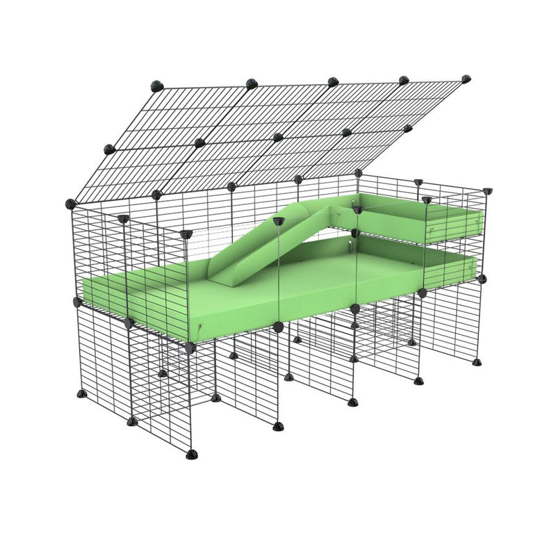 une cavy cage 4x2  avec panneaux transparents en plexiglass pour cochons d'inde avec rehausseur couvercle loft rampe coroplast vert pistache et grilles de kavee